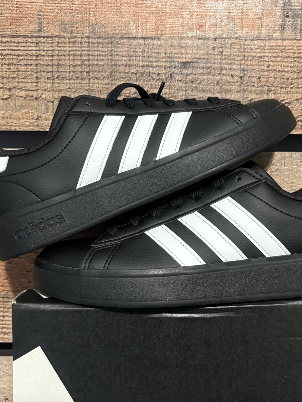 adidas Black Low-Top Sneakers with White Stripes